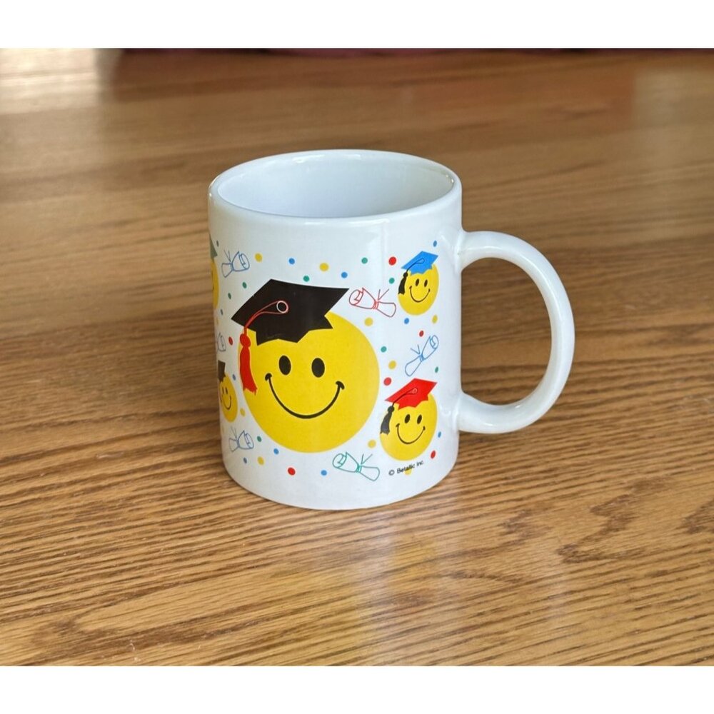 Graduation Smiley Face Mug White Ceramic With Colorful Caps & Diplomas